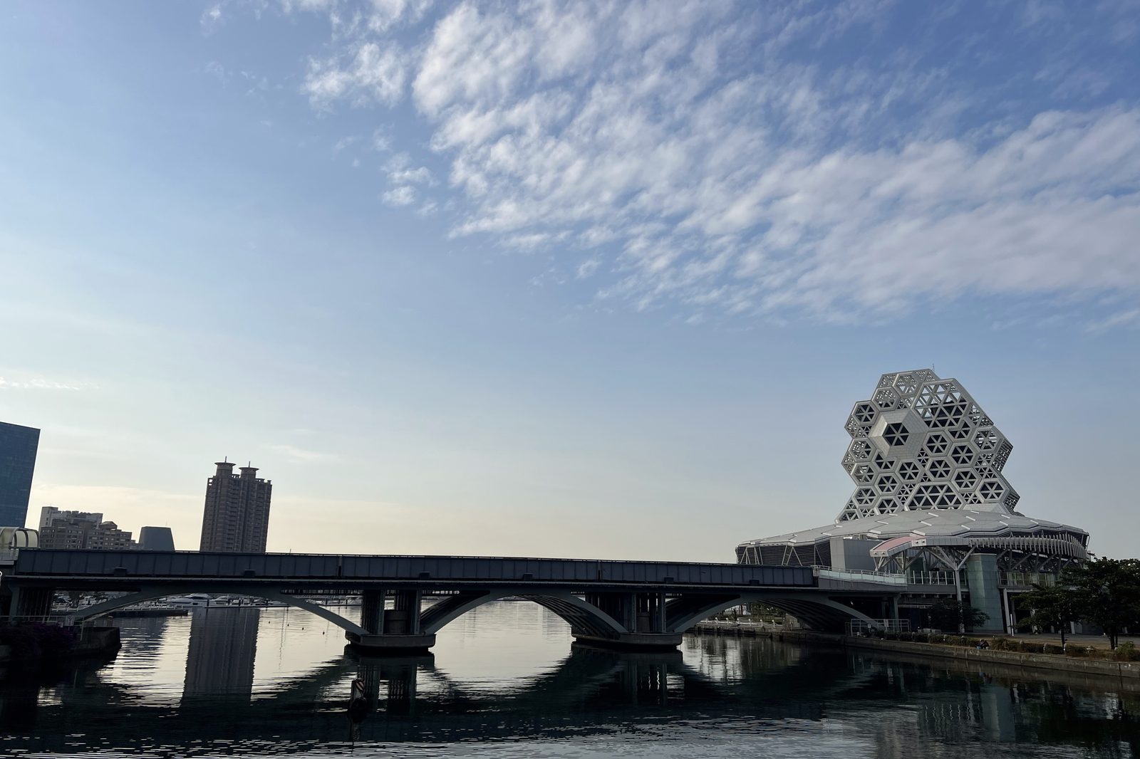 Dawn light over the honeycomb-shaped exhibition hall