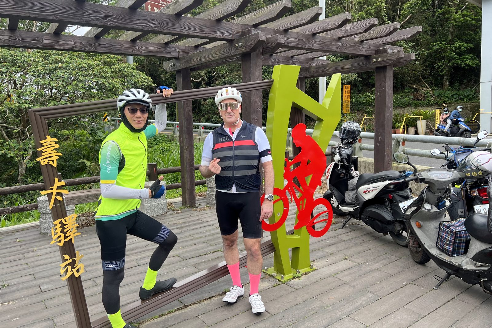 Posing at the Shoka Iron Horse Station sign