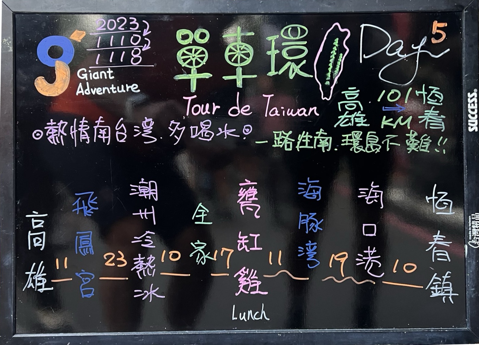 Hand-written chalkboard listing Day 5's route